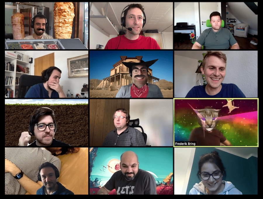 A screenshot of a Zoom meeting with many participants, some of them with funny graphical filters activated